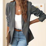 Elegante, zachte, effenkleurige reversknopenjas